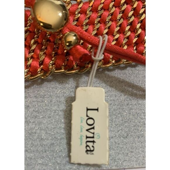 Lovita rhinestone encrusted salmon color bracelet expands 12in retracts 6in - Picture 4 of 6